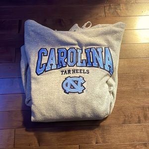 Men’s medium, champion Carolina tar heels university hoodie.